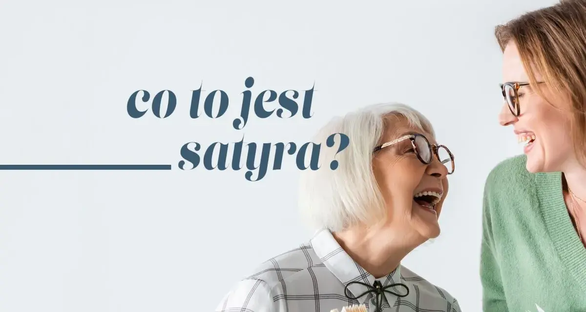 Dwie kobiety śmieją się, trzymając książki. Jedna z nich pyta: "co to jest satyra?".