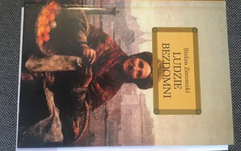 Okładka książki Stefana Żeromskiego "Ludzie bezdomni". Obraz przedstawia postać w brązowych szatach, niosącą kosz z pomarańczami.