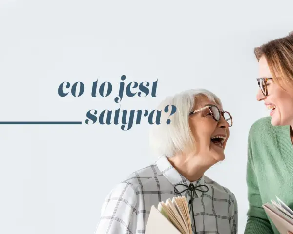 Dwie kobiety śmieją się, trzymając książki. Jedna z nich pyta: "co to jest satyra?".