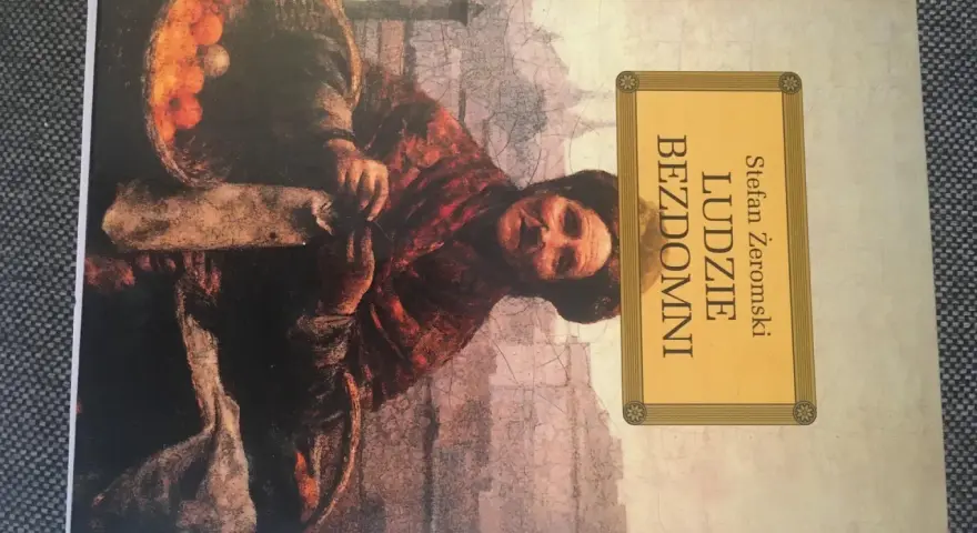 Okładka książki Stefana Żeromskiego "Ludzie bezdomni". Obraz przedstawia postać w brązowych szatach, niosącą kosz z pomarańczami.