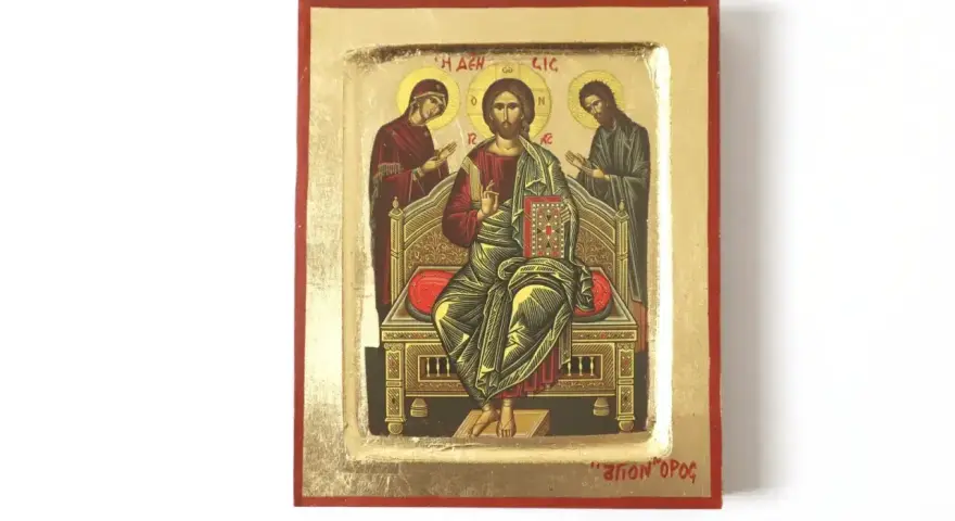 Ikona przedstawia motyw Deesis w Bogurodzicy: Chrystus Pantokrator siedzi na tronie między Matką Bożą a św. Janem Chrzcicielem, w złotej poświacie.